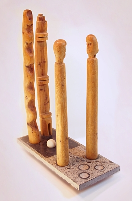 “In the Presence of (Hopi)” 1983-86 Yew, marble ball, on worked slate base 360 x 150 x 20cm