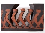 “Crossing Open Ground” (pierced relief)   1992   Sapele with ochre and charcoal   61x93x8cm